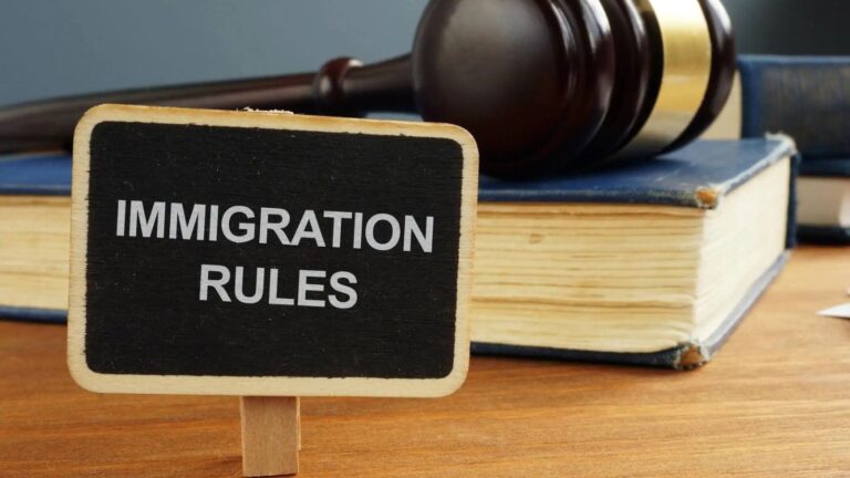 Immigration Rules blackboard with legal gavel and law books representing appendix v immigration rules 2025 technical analysis