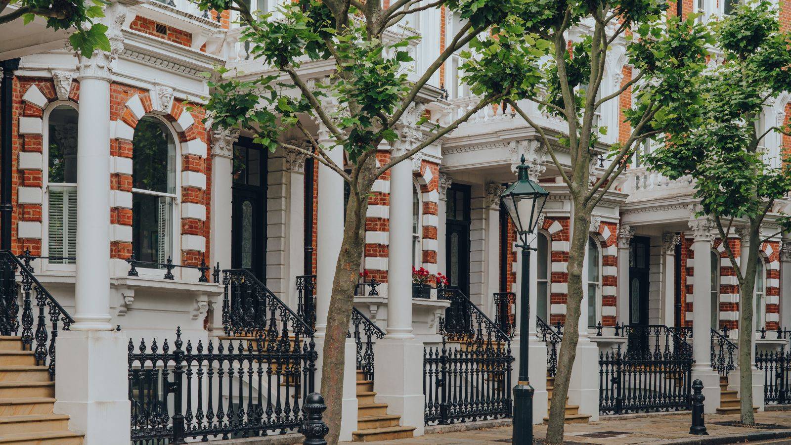 Traditional Victorian houses in Kensington London representing UK property investment for non residents in premium British real estate market