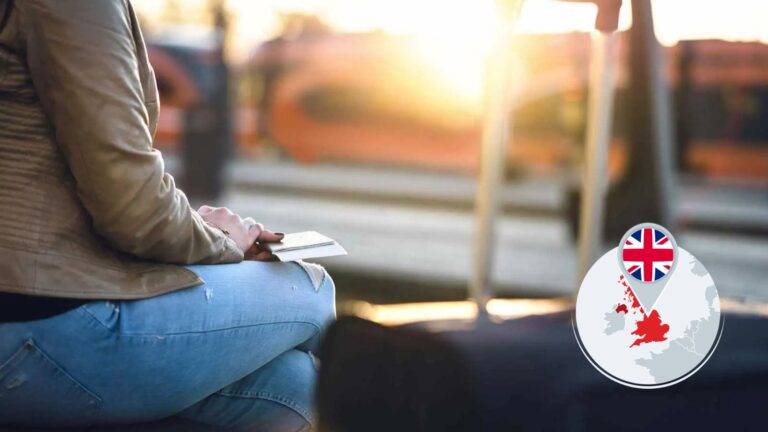 Person holding passport with luggage awaiting decision representing discretionary leave to remain UK 2025 application process