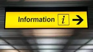 Airport information sign representing guidance for lost or stolen UK visa 2025 recovery procedures