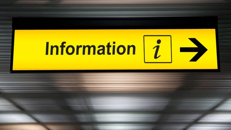 Airport information sign representing guidance for lost or stolen UK visa 2025 recovery procedures