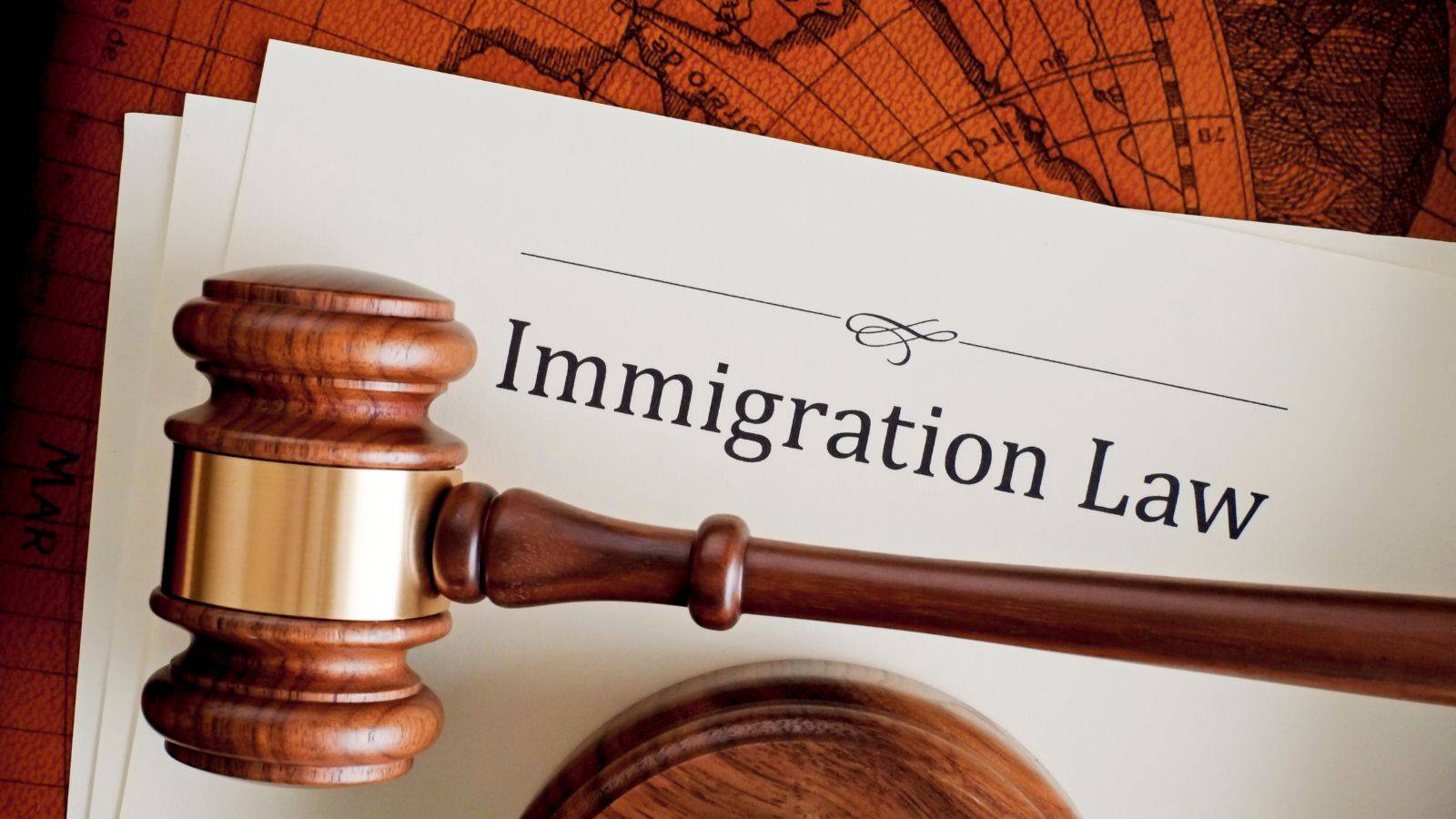 Immigration Law document with wooden gavel representing paragraph 322 5 immigration refusals 2025 legal analysis and judicial decisions