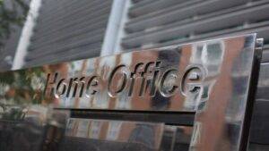 Home Office glass sign on government building representing UK immigration bail 2025 applications and official authority processes