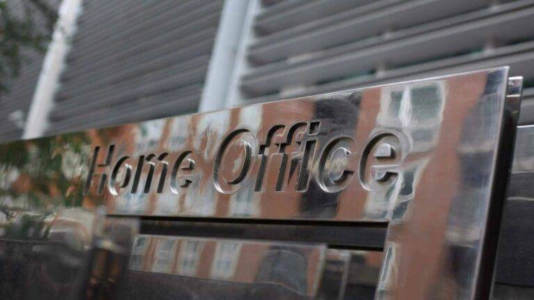 Home Office glass sign on government building representing UK immigration bail 2025 applications and official authority processes