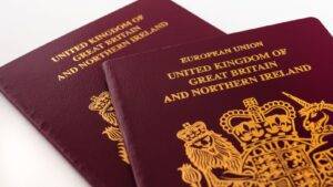 Uk Passports With Royal Coat Of Arms Representing Break In Continuous Residence Uk 2025 Legal Requirements