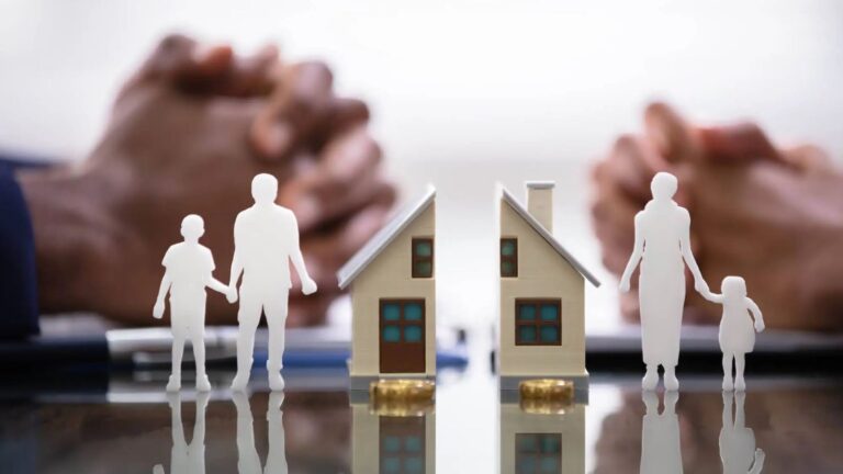Family separation model with house representing no-fault divorce UK 2025 property and child arrangement considerations