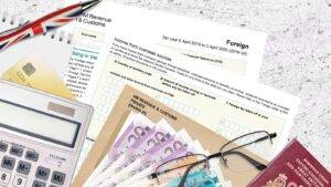 British passport with HM Revenue & Customs tax documents and calculator representing settlement application tax discrepancy UK 2025 visa requirements