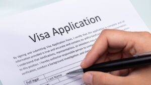 Visa Application Form Being Completed Representing Section 3C Leave Uk 2025 Temporary Immigration Status During Pending Applications