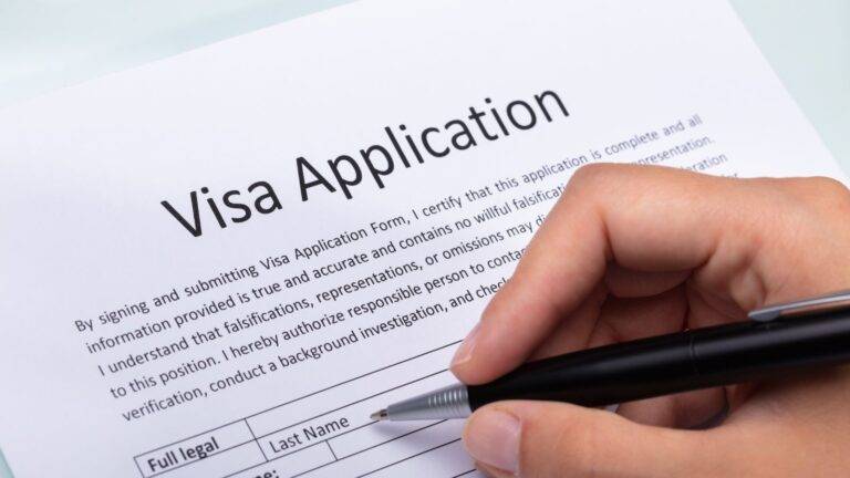 Visa application form being completed representing Section 3C leave UK 2026 temporary immigration status during pending applications