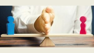 Person Weighing Divorce Decision With Male And Female Figures Balanced On Seesaw Representing Is Divorce Right For You Uk 2025 Decision-Making Process With Professional Mediation Guidance