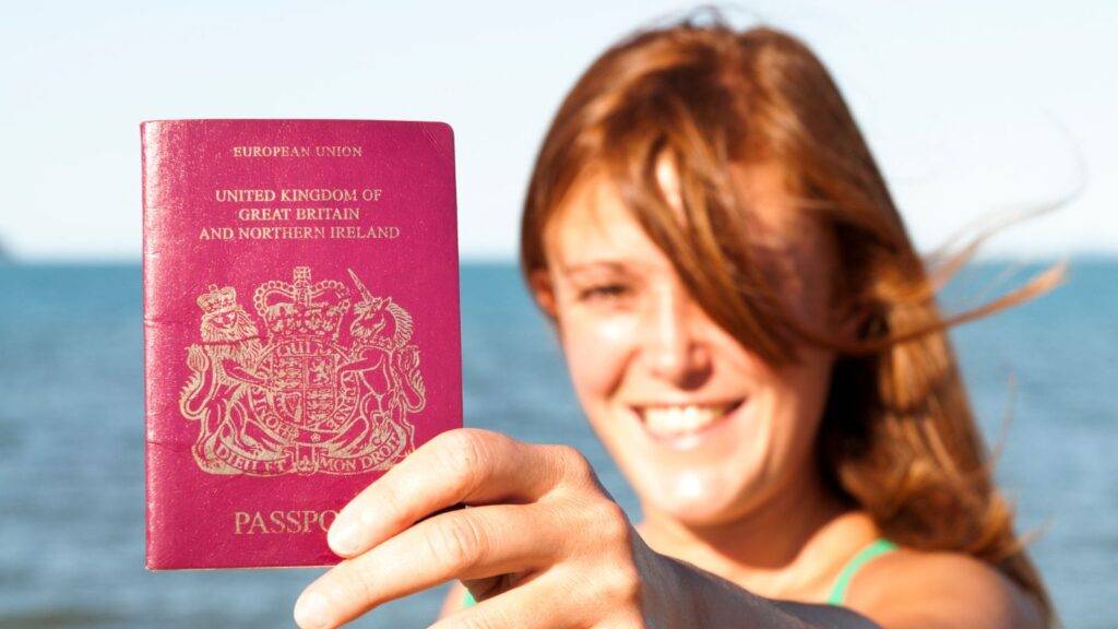 Early ILR concession represented by young adult woman holding British passport showing UK young adult settlement guide success for 18-24 year olds half-life rule immigration pathway
