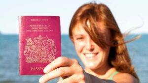 Early ILR concession represented by young adult woman holding British passport showing UK young adult settlement guide success for 18-24 year olds half-life rule immigration pathway