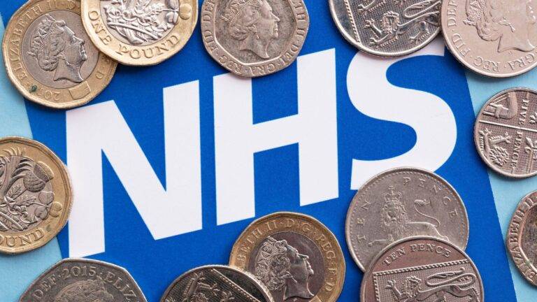 Rejected visa application stamp representing NHS debt visa applications UK 2026 causing immigration refusals and legal challenges