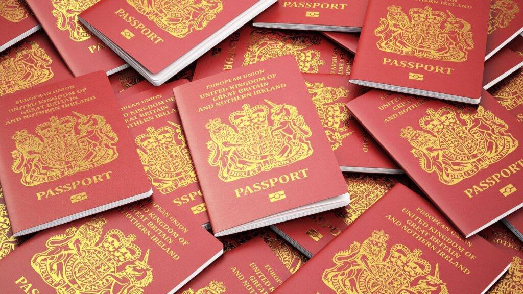British passports displayed showing good character requirements British citizenship 2025 applications and nationality documentation process