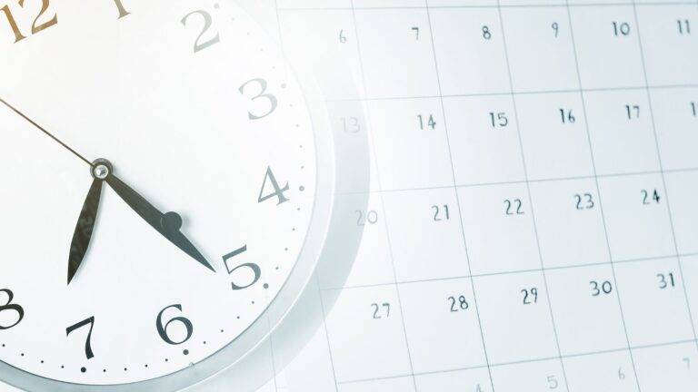 Clock overlaying calendar representing waiting periods and timelines when spouse does not respond to divorce papers UK 2025 deemed service procedures