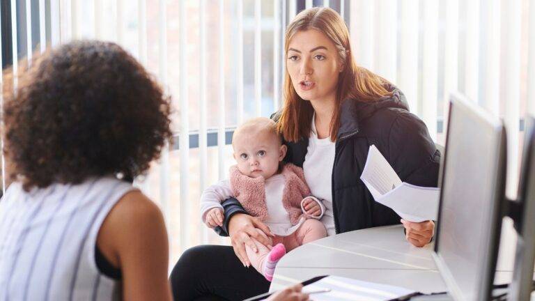 Local authority involvement children represented by mother holding baby consulting with social services professional showing Section 17 Section 47 procedures care orders assessment meetings