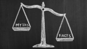 Scales of justice showing myths versus facts representing fact finding hearings children cases UK 2025 court procedures