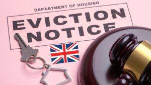 Eviction notice document with legal gavel house keys and UK flag representing section 21 abolition UK 2025 housing law reform