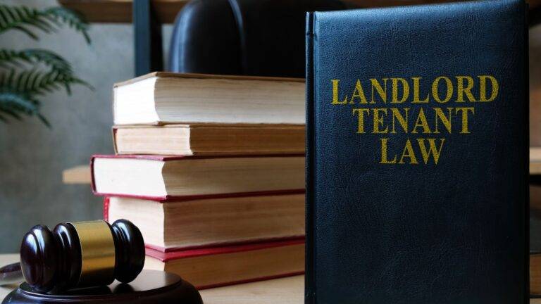 Landlord tenant law book with gavel and legal texts representing comprehensive guidance for rent repayment order RRO UK 2025 claims and housing tribunal proceedings
