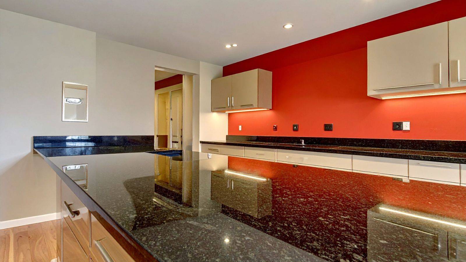 Modern fitted kitchen showing built-in cabinets and integrated appliances illustrating chattels vs fixtures stamp duty 2025 legal classifications