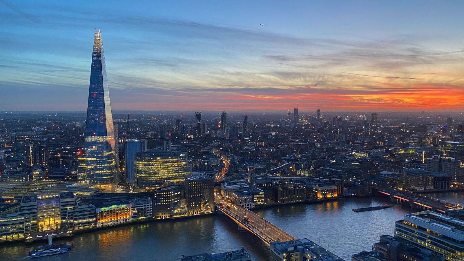 London skyline sunset with The Shard representing property subject to register of overseas entities UK 2025 registration requirements and foreign ownership disclosure obligations