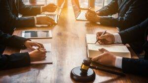 Professional Consultation Meeting With Legal Gavel Representing Interest Only Mortgages Legal Considerations Uk Guidance And Advisory Services