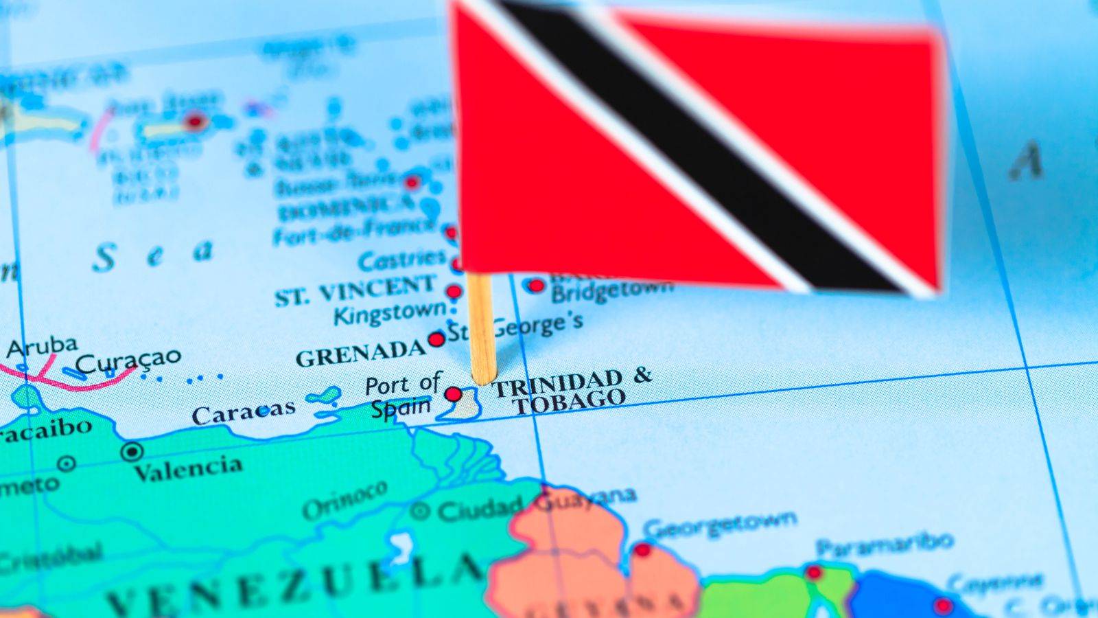 Caribbean map with Trinidad and Tobago flag pin showing geographic location for UK visa Trinidad Tobago 2025 travel requirements