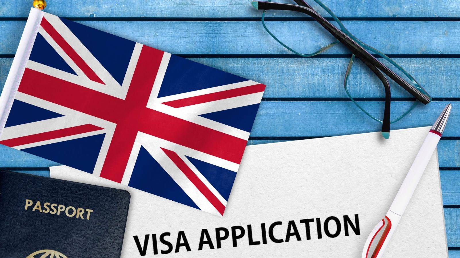 UK flag with passport and visa application documents representing UK student visa 2025 requirements and application process