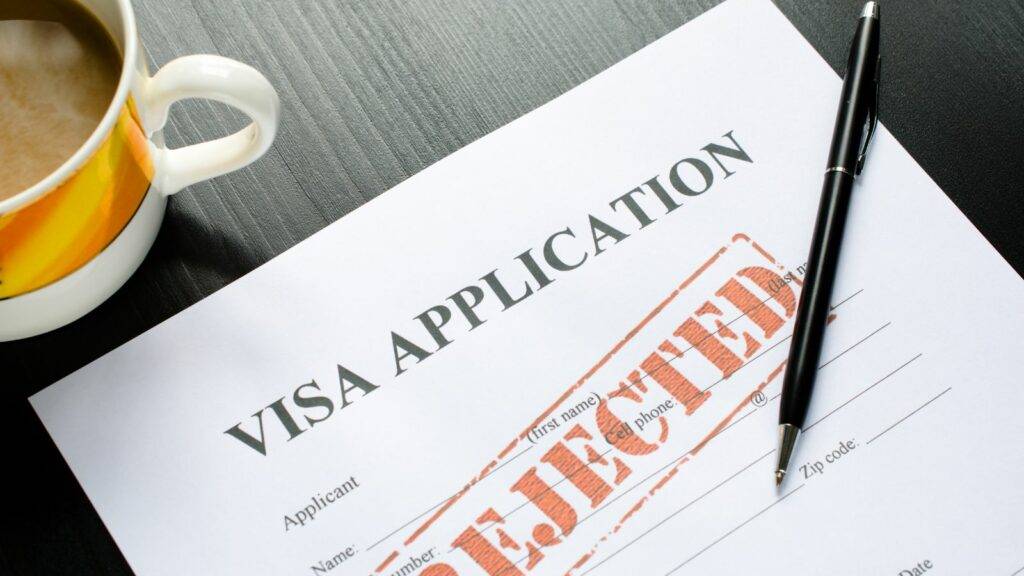 Visa application form with rejected stamp – UK visa refusal and immigration appeal services