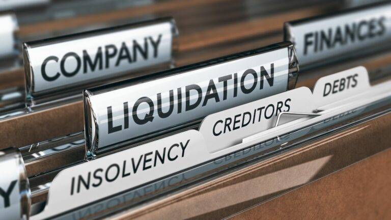 UK corporate insolvency process shown with file tabs for liquidation, creditors, and debts