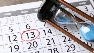 Calendar Showing Processing Deadline With Hourglass – Uk Visa Processing Times Concept