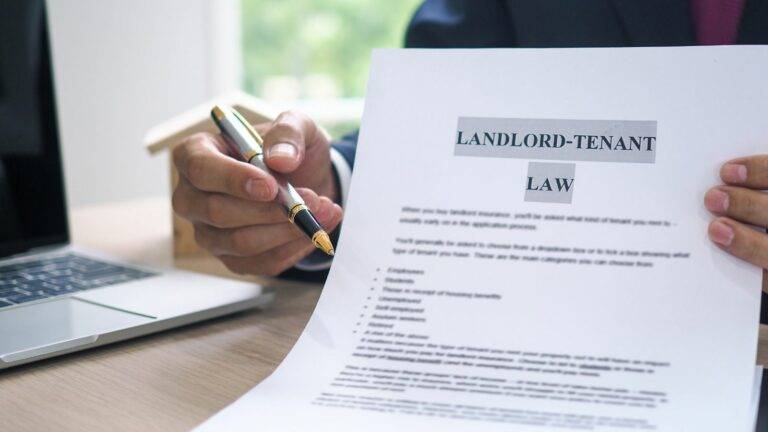 Renters Rights Bill 2025 - landlord reviewing legal tenant law document with pen