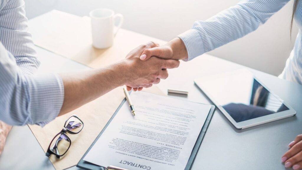 employment law solicitors in London discussing legal agreement