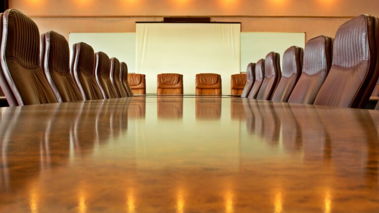 Luxury family business boardroom with leather chairs representing family business protection UK 2025 planning discussions