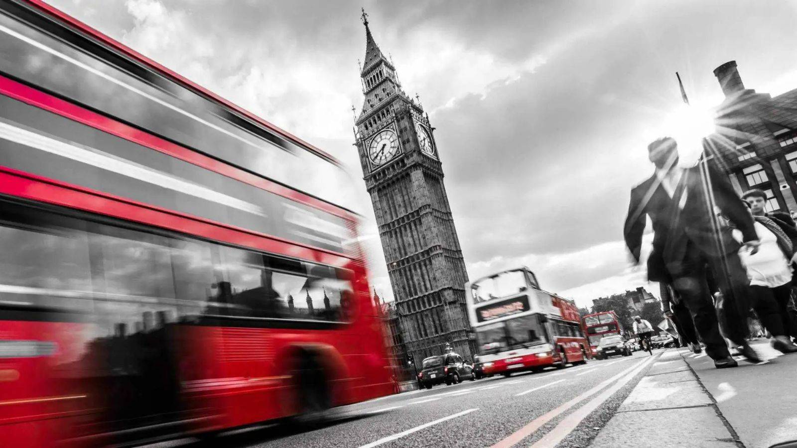 London Big Ben and red double-decker buses with business professionals representing UK visitor visa solicitors 2025 immigration services