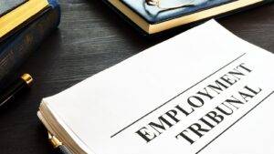 Employment Tribunal Legal Document With Law Books Representing Uk Employment Tribunal Bonus Culture 2025