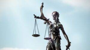 Connaught Law Blog 2 Lady Justice Statue With Scales And Blindfold Representing Uk Civil Litigation History 1873-2025 Showing 152 Years Of Legal Evolution From Judicature Acts To Modern Digital Courts