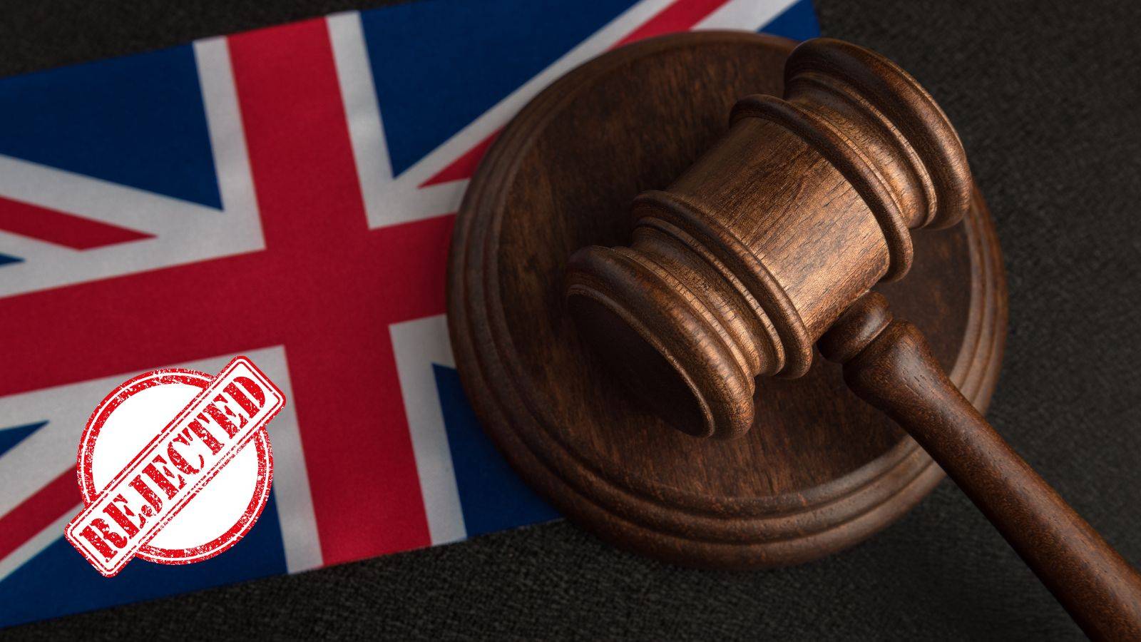 Union Jack flag with legal gavel and rejected stamp representing part suitability UK immigration 2025 visa refusal grounds
